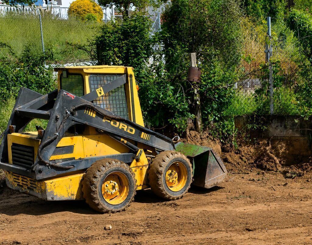 Minicargadora para movimiento de tierras y carga de escombros
